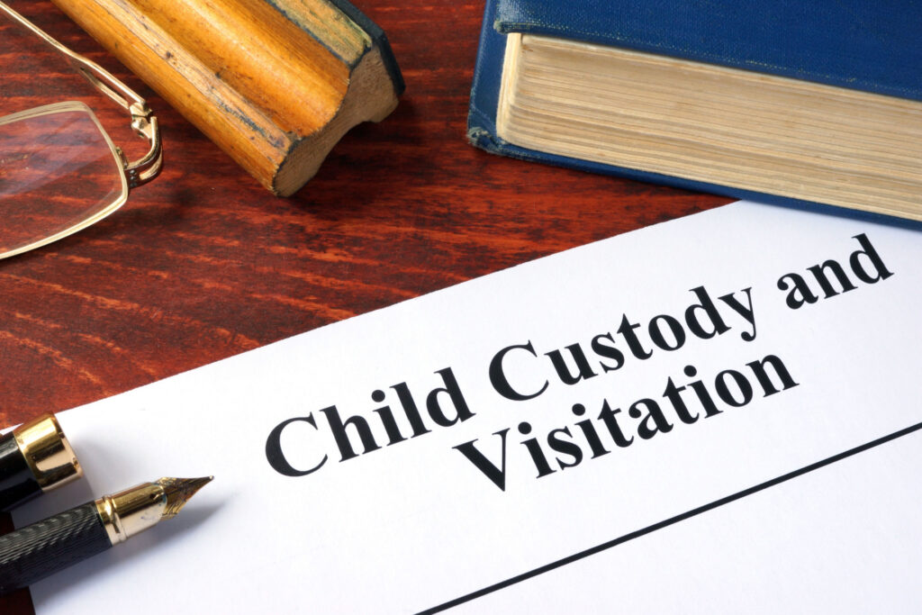 Parents gathering evidence for child custody Australia hearings in a family court setting.